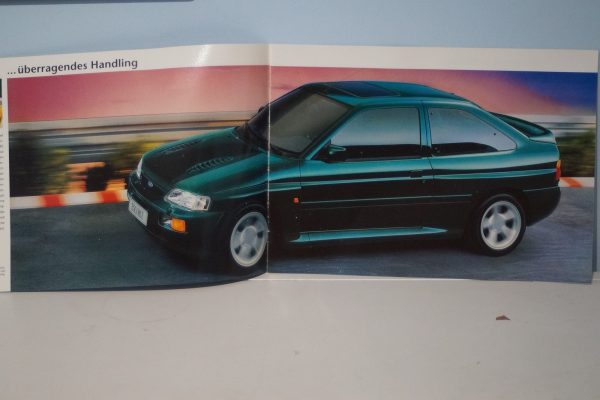 Microchamps ford escort cosworth red 1:64th 510641106 and ford escort rs cosworth broucher in german