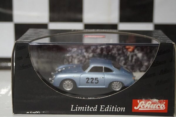 Schuco porsche caymen s in dark blue ref 04742 1/43