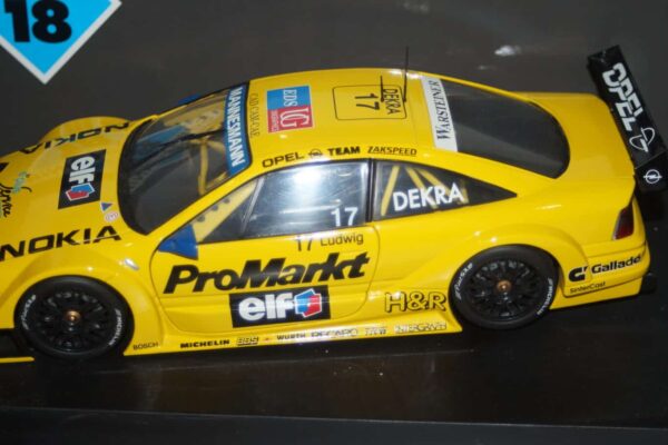 Minichamps opel calibra itc 1996 k.ludwig 17 promarkt 1:18 180 964217