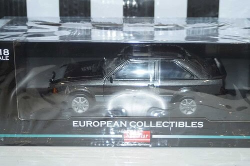 Sunstar ford escort rs 1600i 1984 graphite grey (rhd) ref h5000r 1:18 scale uk exclusive