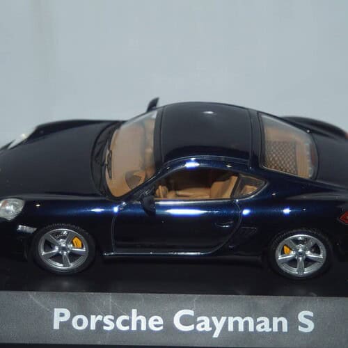 Schuco porsche caymen s in dark blue ref 04742 1/43