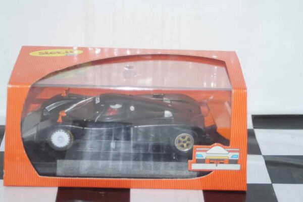 Slot.it mazda 787b white kit been painted black with orange wing mirrors and spoiler ca15z