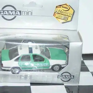 Gama opel vauxhall vectra cavalier polizei 81170000 in 1:43 scale