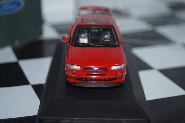 Minichamps ford escort cosworth red in dealer box -missing wing mirror