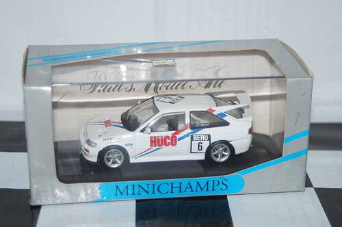 Minichamps ford escort cosworth red in dealer box -missing wing mirror