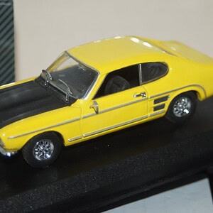 Detail cars ford capri 3000 gt 1969 in yellow 1:43 art301