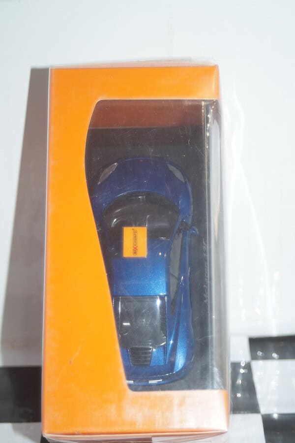 Maxichamps mclaren 12c 2011 blue minichamps in 1:43 scale 133021
