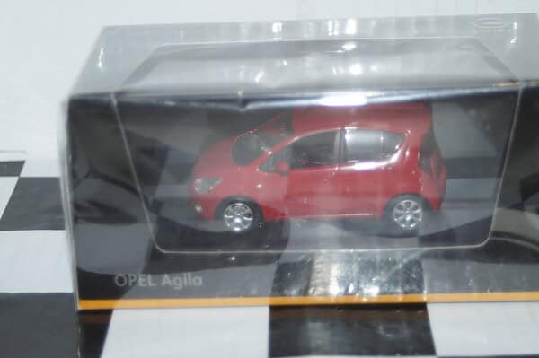 Schuco opel / vauxhall agila in red in 1:43 scale